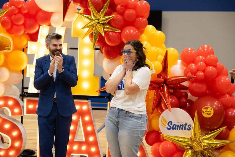 Teacher with an amazed emotion on her face